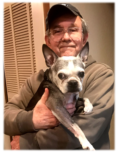 Photo of Donald D. Gilder, author of this website, holding his dog "Reloj".